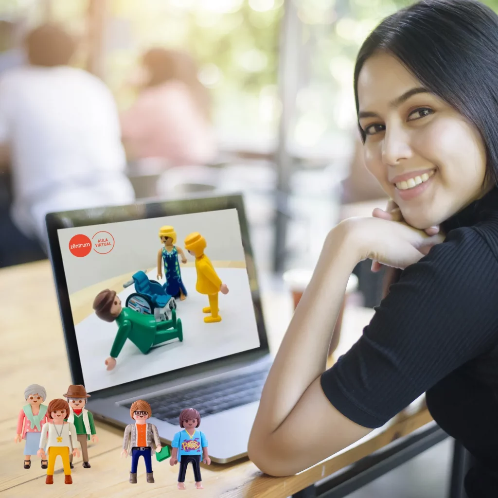 Alumna tomando clases online de Constelaciones Familiares en sesión individual desde su ordenador.